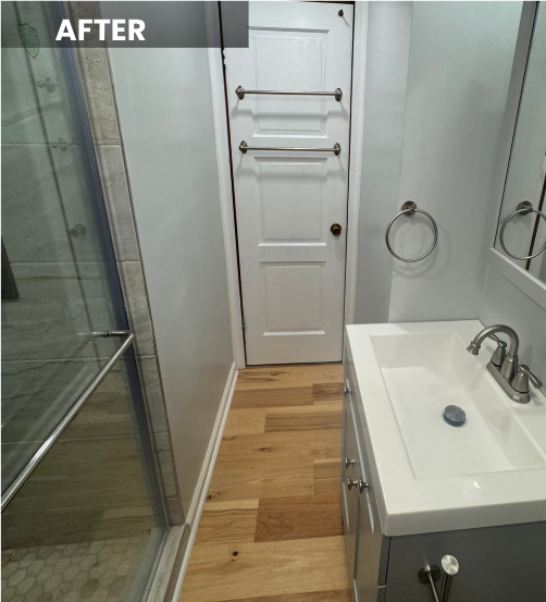 Completed bathroom remodel in Savannah, GA featuring custom tile, modern vanity, new flooring, and updated fixtures
